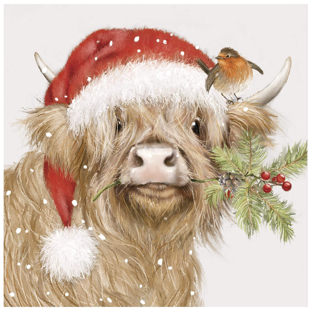 A Christmas card of a Highland cow wearing a Santa hat, with a small bird perched on one horn and greenery with red berries attached. Snowflakes fall around the cow.
