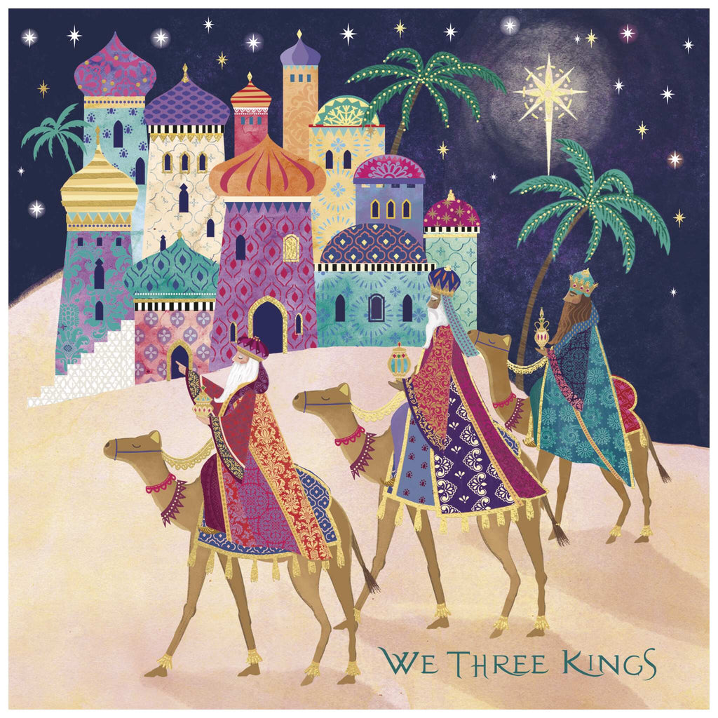 An illustration of the three kings riding camels under a starry night sky, dressed in ornate robes and crowns. They follow a bright star toward a colourful city with domed buildings and palm trees. The text 'WE THREE KINGS' appears at the bottom