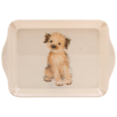 A sweet Border Terrier is set on a small tray. This tray is perfect for transporting cups of tea and sweet treats.