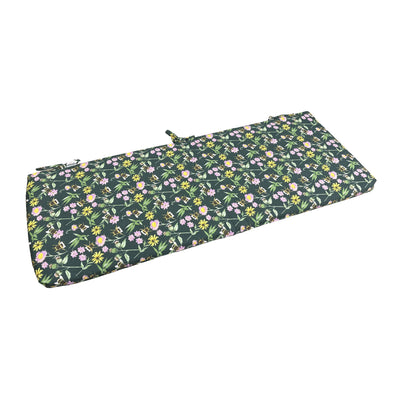 Floral-patterned bench cushion on a white background
