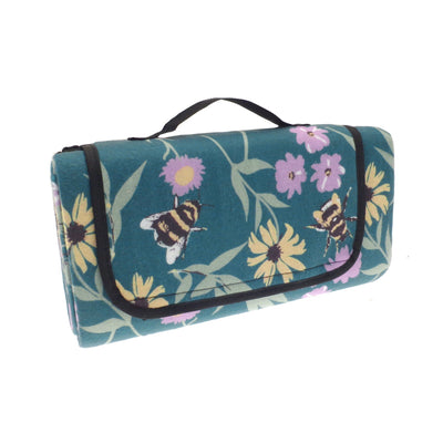 Floral-patterned picnic blanket with bees and flowers on a white background