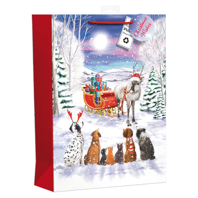 A Christmas gift bag featuring winter pets.