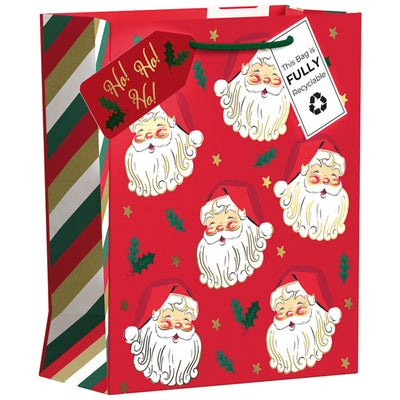 Red gift bag with Santa Claus and striped design on a white background.