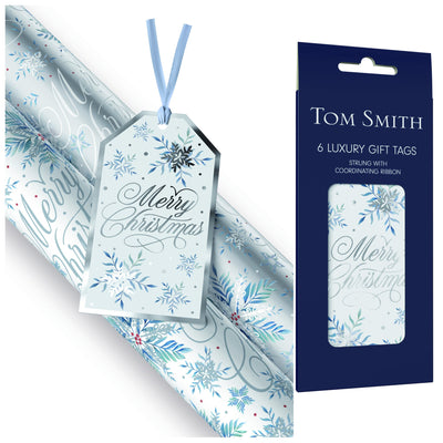 Shiny silver gift tags by Tom Smith. The tags feature a snowflake design.