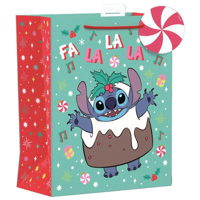Christmas giftbag featuring Disneys Stitch dressed as a Christmas pudding.