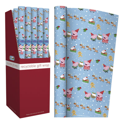 Recyclable gift wrap set shown with a red cardboard display box containing rolled sheets and a large flat sheet displaying a light blue Christmas pattern with Peppa Pig characters, gingerbread men, and snowflakes.