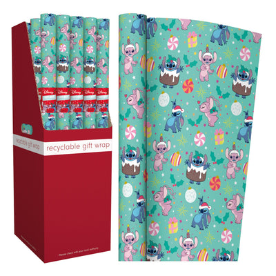 Disney-themed recyclable gift wrap shown both rolled in a display box and flat, featuring Stitch and Angel illustrations on a mint green background with candy, presents, and holiday motifs.