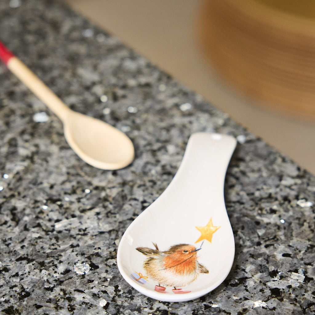 Illustration of Ralph Robin on a spoon rest. The image shows it placed on a countertop.