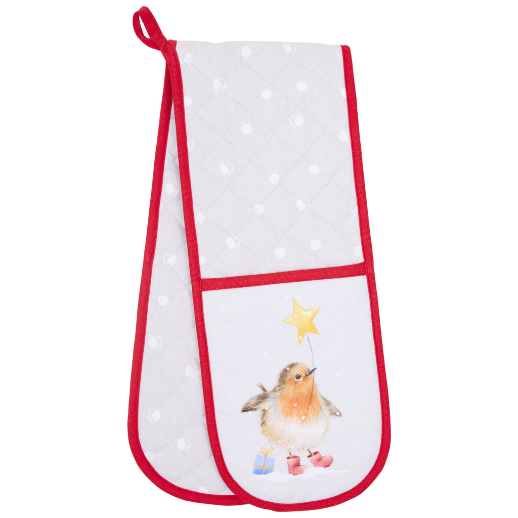 A white double oven glove with a quilted polka dot pattern and red trim, featuring an illustration of a robin wearing red boots, standing next to two wrapped gifts and looking up at a golden star.
