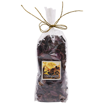 A clear cellophane bag filled with dried cinnamon-scented flower petals and leaves, tied with a tan string and featuring a front label that reads cinnamon. This pot pourri makes a wonderful fragrance for your home during Christmas.