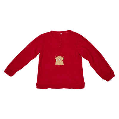 Children's red pyjama top with a Christmas Highland cow illustration on the front.