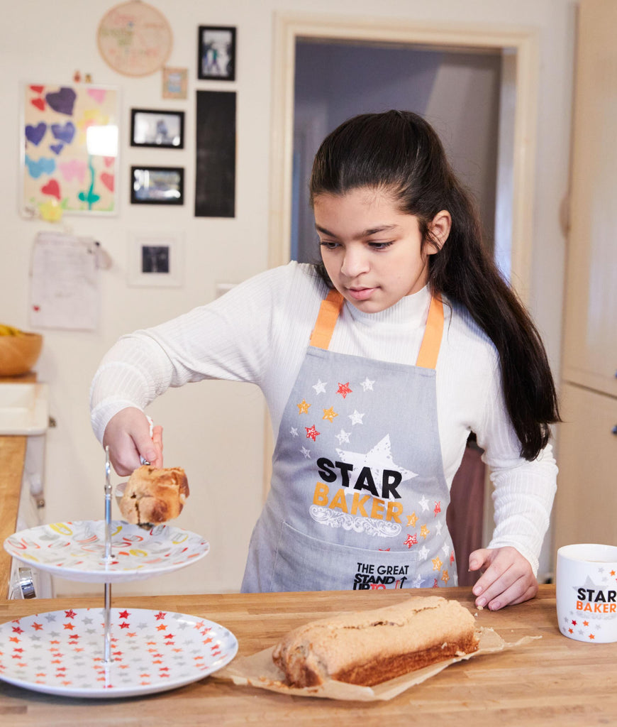 The Great Stand Up To Cancer Bake Off 2023 Star Baker Adult & Kid Apron Bundle