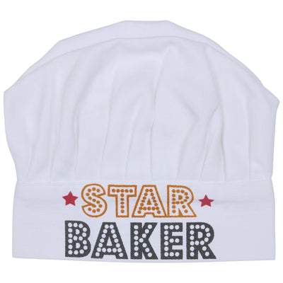  A white kids chef’s hat with the words ‘STAR BAKER’ embroidered on the front in bold decorative lettering, with two red stars on either side of the word ‘STAR’. This hat is part of the Great Stand Up To Cancer Bake Off.