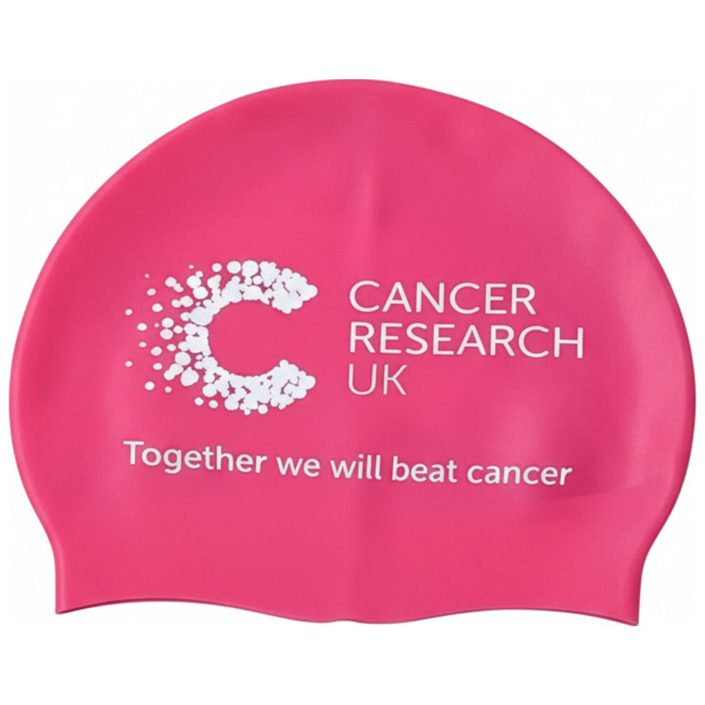 Pink swimming cap. This silicon swimming cap is stretchy and can fit onto all heads shapes. It accommodates longer women's hair. A perfect accessory for swimming faster and  for Cancer research events.