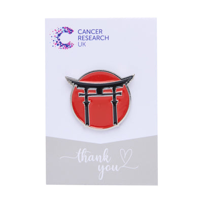 Shinto Torri Gate wedding favour on a backing card featuring the Cancer Research UK logo and a thank-you message.