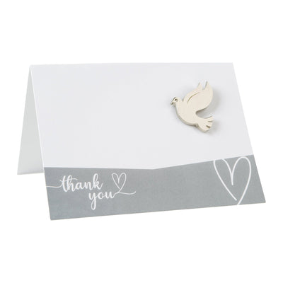 White wedding placecard with a grey border, heart‑line design, and a small raised dove decoration on the front.