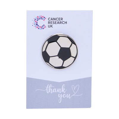 Football wedding favour on a backing card featuring the Cancer Research UK logo and a thank-you message.