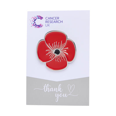 Poppy wedding favour on a backing card featuring the Cancer Research UK logo and a thank-you message.