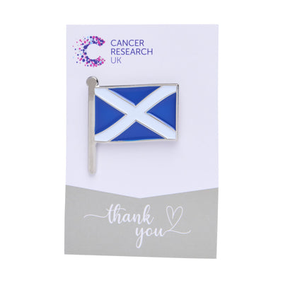 Scottish flag wedding favour on a backing card featuring the Cancer Research UK logo and a thank-you message.