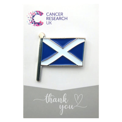 Charity wedding favour pin badge of the Scottish flag on a flagpole. Also great for showing everyday Scottish pride.