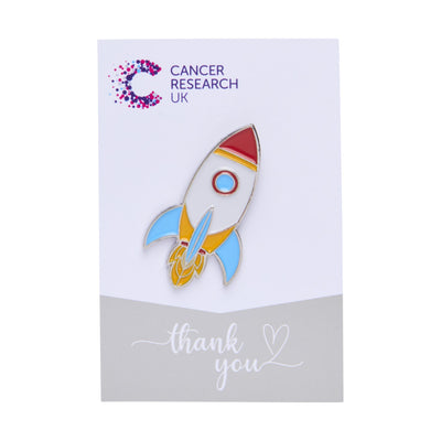 Rocket wedding favour on a backing card featuring the Cancer Research UK logo and a thank-you message.