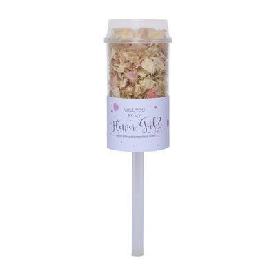Wedding confetti pop filled with dried petals on a white stick, with a label reading “Will you be my Flower Girl?”